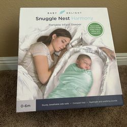Brand New Never Used Baby Delight Snuggle Best Portable Infant Sleeper Color Grey 