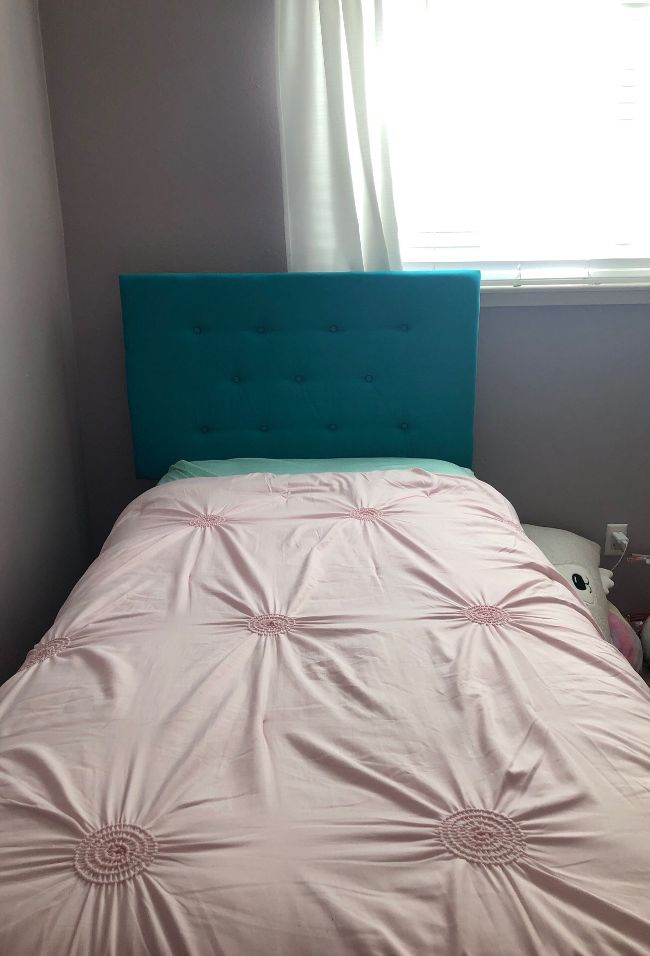 Hand built tuffed twin bed frame,