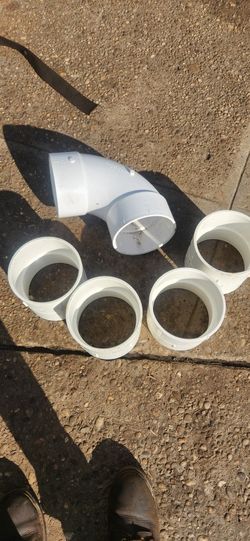 4  6 inch PVC couplers and 1. 6 inch PVC 90.