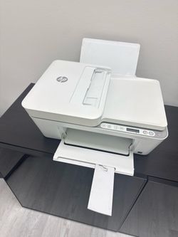 Office stuff, printer, plants, nespresso machine, whiteboard