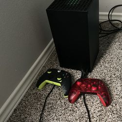 Xbox series X with 2 controllers 1 wired and 1 wireless