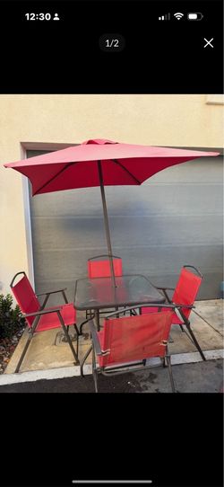 Table and chair umbrella