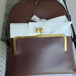 Coach Kisslock Frame Backpack