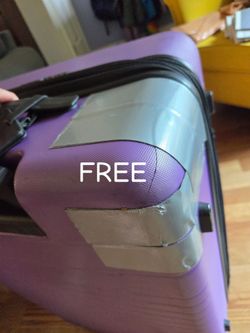Free suitcase, some damage