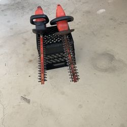 Two electric hedge trimmers