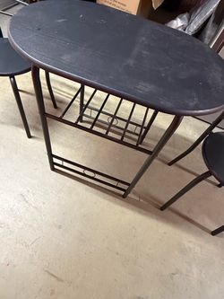Compact Oval Dining Table with 2 Stools