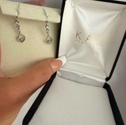 Kay Jewelers Silver Heart Drop Earrings  Chic heart-shaped drop earrings. Sparkling design from Kay Jewelers. Never worn.