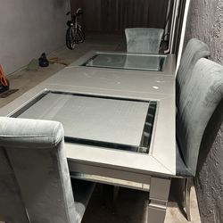 Dining Table with Gray Velvet Chairs original retail for $1550