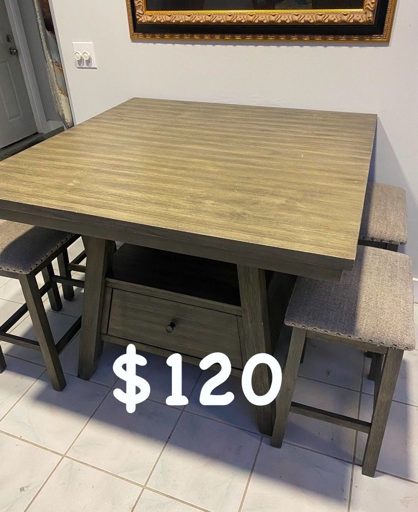Solid wood dining table with four chairs