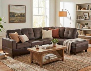 Brown microfiber sectional couch and ottoman