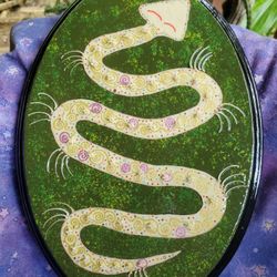 bone art. handmade, wall hanging. snake
