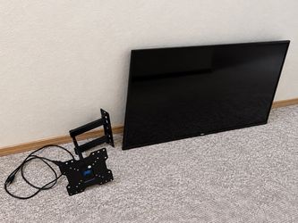 TCL 50” 4K Google Smart TV + Swivel Wall Mount — $100