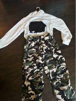 Camouflage outfit with white jacket