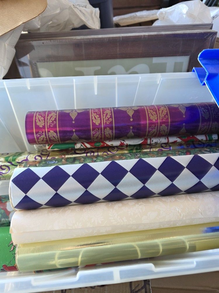 CHRISTMAS WRAPPING PAPER IN STORAGE BIN