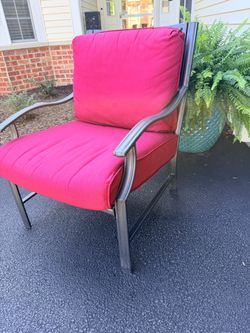 Patio chair - solid, doesn’t fold/collapse. Great for fire pit seating