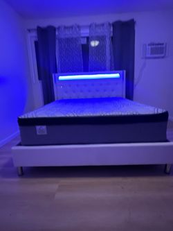 Queen Bed Frame With Led Lights Mattress Included.
New in a box        
We offer delivery and instal