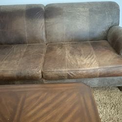 Brown Leather Sofa.     FREE