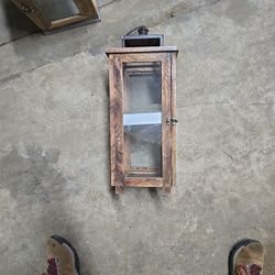 Wooden outdoor decorative lantern with
metal top