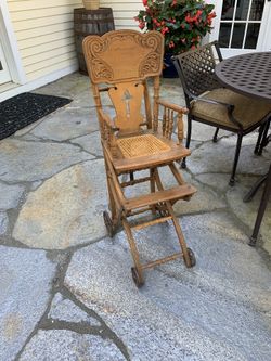 Antique oak high chair/stroller
