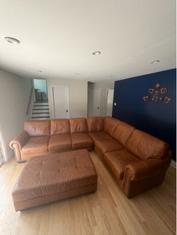 Leather Sectional + Ottoman — Retail Over 10,000