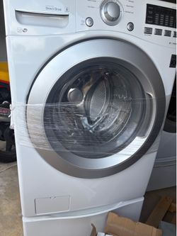 LG front-load washer/dryer w/pedalstools! Gently used. Exceptional condition.