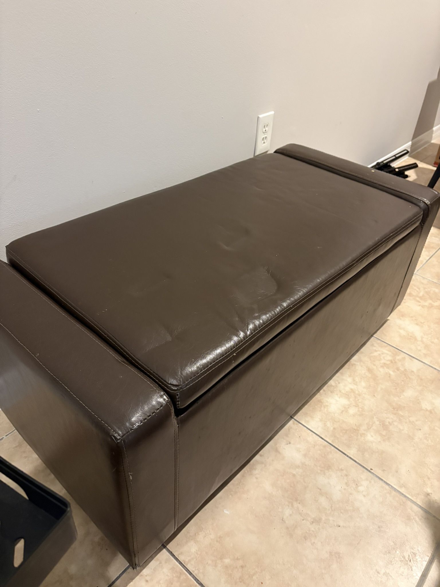 Brown leather ottoman with storage