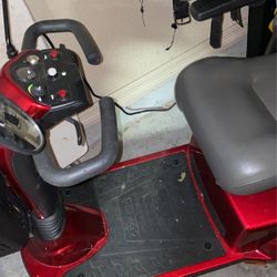 Electric Scooter Like New)Golden ,3 Wheels , Upto 320lbs, Candy Red.