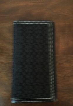 Brand new coach Check book