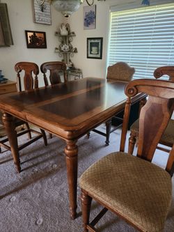Dining room table with leaf. 60" long, 40 " wide& 35" high, chairs are 251/2 to seat