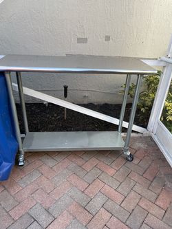 Stainless steel table 48 inches by 17.5