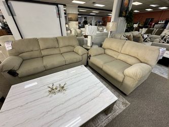 Brand new sofa and loveseat beige ASHLEY FURNITURE