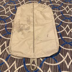 MERCURY TACTICAL GEAR Garment Cover with Full Zipper / Hanging Loop Handle - Beige   Good pre-owned condition. It is stained on the outside as shown i