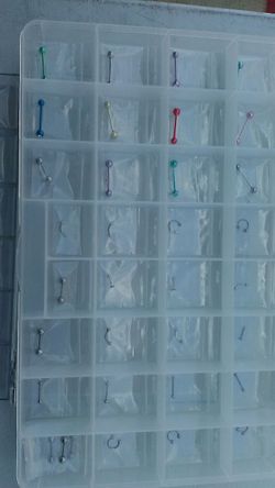 Pierced body jewelry $3 245 tapers gauges of all sizes belly rings lip septums industrial bars also purses and wallets $30 sets