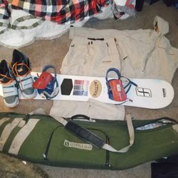  Burton Snowboard With Bindings, Boots, And Oakley Pants And Jacket With A Carry Case, Burton...GOOD DEAL $200