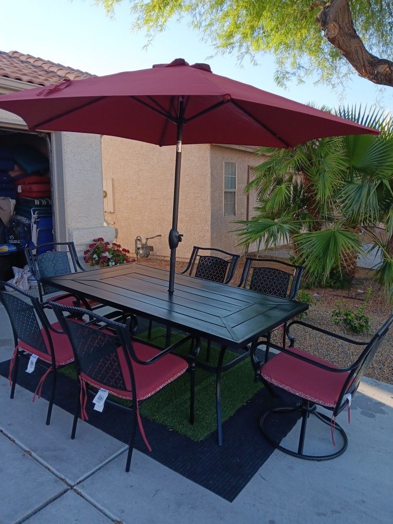 Patio Set Table And 6 Chairs With New Cushions And New Umbrela