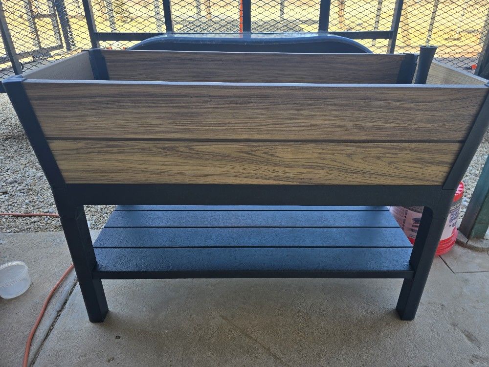 Vigoro
Oak Vinyl Resin Garden Bed Planter with Storage Shelf (44 in. L x 18 in. W x 31 in. H)