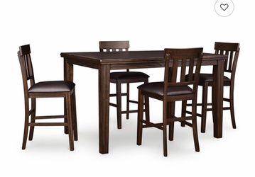 Brand new Ashley Furniture dining room set