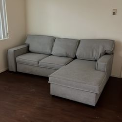 Sofa sectional with extra pullout sleeper