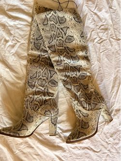 Over the knee Croc boots, brand new