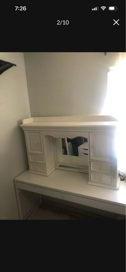 Vanity with lighted mirror