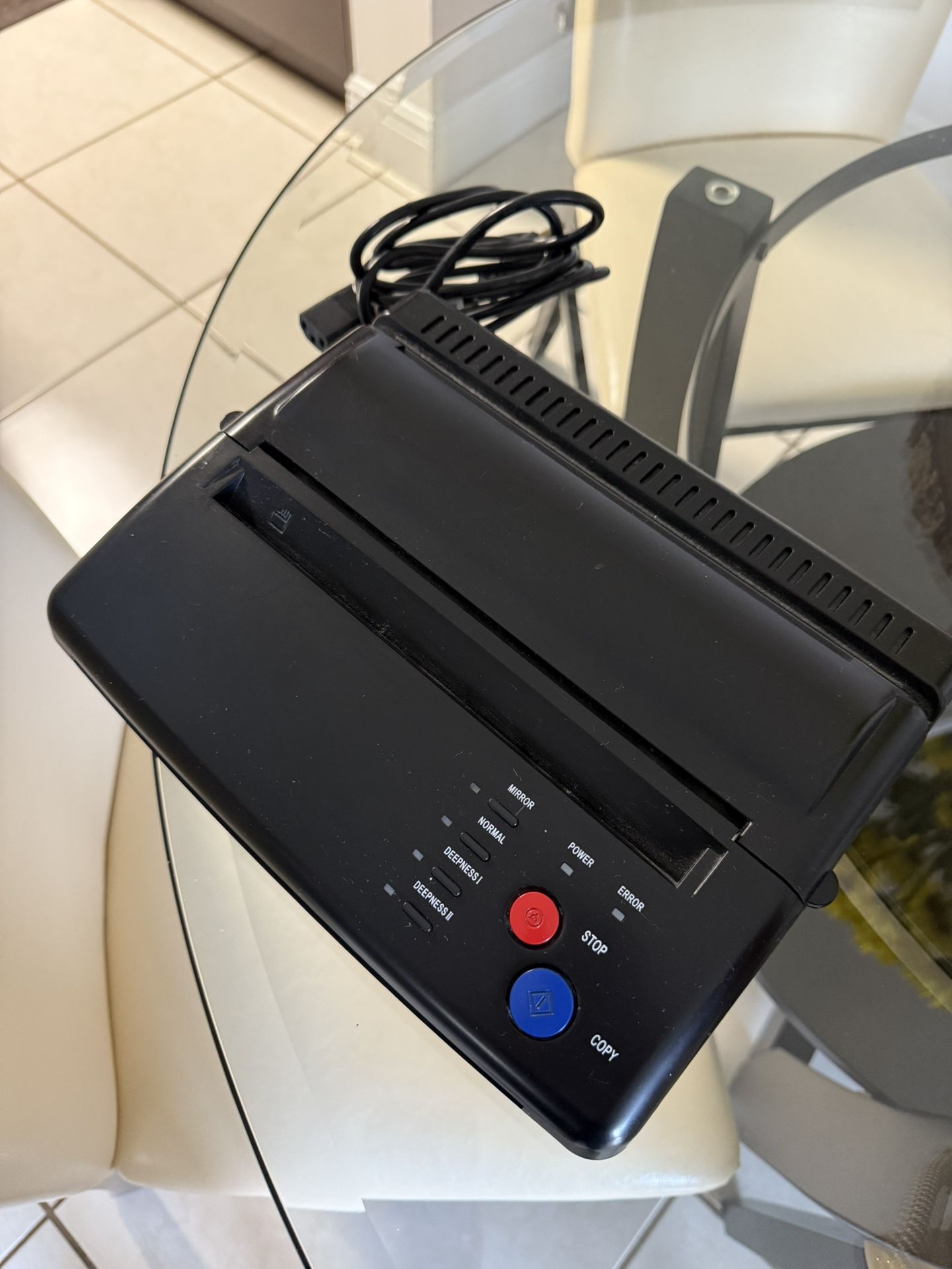 tattoo thermal stencil machine, also known as a tattoo transfer machine or copier.