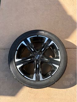 Set of Kia dealer rims and tires
