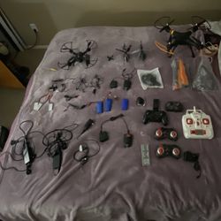 3 Drones And 2 Helicopters And Chargers And Extra Batteries 