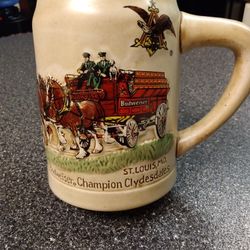 1980 BUDWEISER STEIN. THE VERY  1ST ONE IN A SERIES OF HOLIDAY STEINS. 125.00 DOLLARS