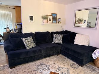 L-shaped sectional couch in good overall condition