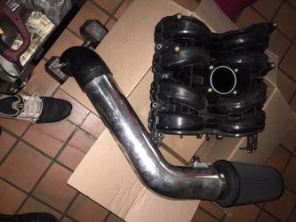 Ford Motorcraft f150 5.4 L intake manifold and specter air intake with filter and mass airflow sensor