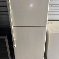 White GE Refrigerator And Freezer