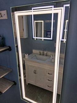 Mirrors with lights