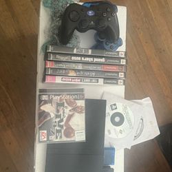 Playstation 2 With Wireless Controllers And Video Games