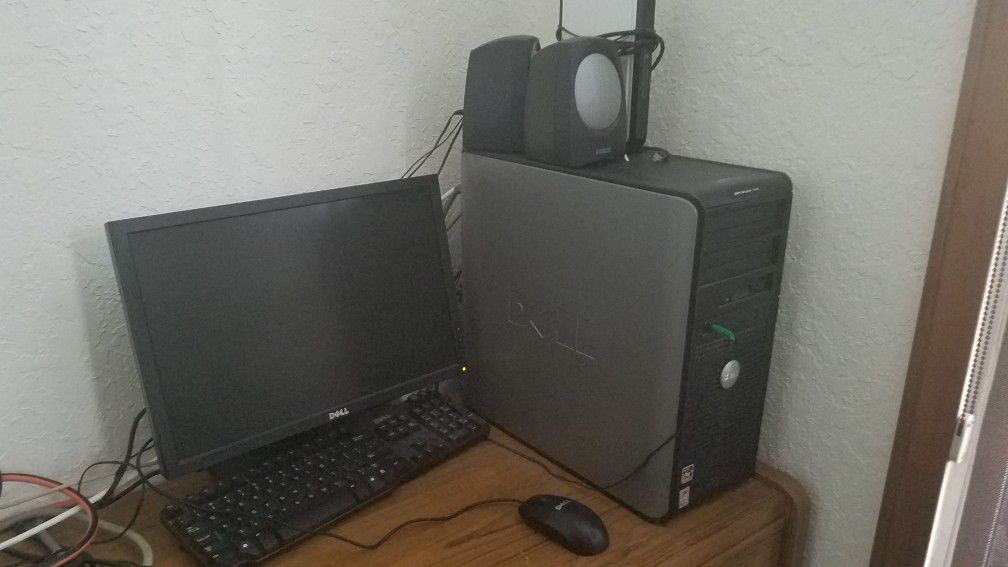 Dell desktop computer; monitor.speakers & mouse